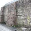 General shot of buttresses on Wall D exterior, direction facing S
