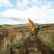 Watching brief, Ditch excavation across the track - progress shot, Clashindarroch Windfarm, Aberdeenshire
