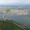 Oblique aerial view from the north shore of the Black Isle to Inverness and the Kessock Bridge, looking S.