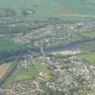 Oblique aerial view of Maryburgh and Conon Bridge, Easter Ross, looking N.