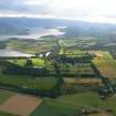 Oblique general aerial view of the northern side of the Dornoch Firth around Skibo Castle, East Sutherland, looking W.