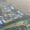 Oblique aerial view of industrial estate at Alness, Easter Ross, looking S.