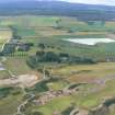 Aerial view of Castle Stuart golf course and Old Petty Church, E of Inverness, looking S.