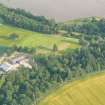 Oblique aerial view of Redcastle Mains on the north shore of the Beauly Firth, looking S.