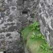 Historic Building Survey photograph, From S, Internal ledge along the E side of the W wing, Coroghon Castle, Canna