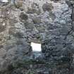 Historic Building Survey photograph, From S, Room A. N wall with opening F02 near the base, Coroghon Castle, Canna