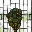 Hospital Chapel. Detail of tree in stained glass window of foliage by Douglas Strachan flanking the central Good Samaritan window in memory of Dr William Lauder Lindsay. 
