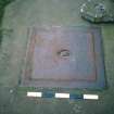 Historic building survey, Cast iron cover for S water cistern outside house 1, Upper Square, Hynish, Argyll and Bute
