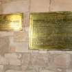 Chancel. View of Baird of Newbyth  brass plaques on north wall. 