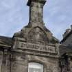 Detail of datestone in gable of former Co-op building at Nos 61-63 Main Street, Clackmannan, reading 'CO:OPERATIVE SOCIETY LD FOUNDED 1863'