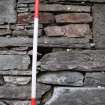 Standing Building Survey photograph, Room 4 ENE wall exterior NNW end quoins, Land at Balmuirfield, Balmuir, Strathmartine, Angus