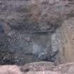 Excavation photograph, E facing section of Area B showing disturbed timber trough, 396-410 Gorgie Road, Edinburgh