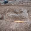 Watching Brief photograph, Irregular spread of stones in SE corner of site taken from S, Cavalry Park, Kilsyth
