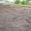 Watching Brief photograph, Central area after topsoil stripping taken from SE, Cavalry Park, Kilsyth