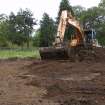 Watching Brief photograph, Post-excavation of stripped area with machine taken from W, Cavalry Park, Kilsyth