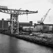 View from south south west across the fitting-out basin of the former Fairfield shipyard in Glasgow (now Kvaerner Govan), showing the Arrol 220-Ton Giant Cantilever Crane (built 1911)
