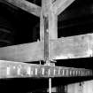 Interior-detail of king-post truss and beaver for sawn-off drying rails in airing loft