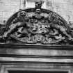 Detail of escutcheon on front entrance.
