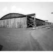 General view of timber hangars from SE.