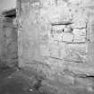 View of South wall showing blocked opening, room 11