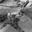 Oblique aerial view of Dairsie Castle and Dairsie Church centred on the castle and church, taken from the ESE.