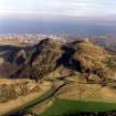 Oblique aerial view of Edinburgh, Holyrood Park centred on the remains of cultivation terraces and Arthur's Seat, taken from the WSW.