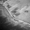 Hoy, Crockness, oblique aerial view, taken from the NE, centred on the Martello Tower and a curving linear soilmark.
