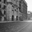 Edinburgh, 1-6 Market Street
View from NE showing NNW front of number 20 North Bridge and NNW front of numbers 1-6 Market Street