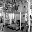 Dundee, Princes Street, Upper Dens Mills, Interior
View of packing shop showing three ram press
