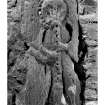 Detail of carved musician on East side of main entrance doorway, Dunderave Castle.