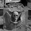 Nisbet churchyard.
Gravestone commemorating Thomas Rutherford d.1743. Rear view showing winged skull.