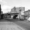 Edinburgh, Gorgie Road, Railway Bridge
View from E showing ESE front of railway bridge with numbers 84-90 in background and numbers 76-82 in foreground