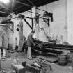 Huntingtowerfield, Bleach and Dye Works, Interior
View of mechanics shop showing Dan Mackay at Dean, Smith and Grace centre lathe