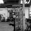 Huntingtowerfield, Bleach and Dye Works, Interior
View of mechanics shop showing Denbich pillar drill with back-gears