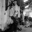 Huntingtowerfield, Bleach and Dye Works, Interior
View of mechanics shop showing Dean, Smith and Grace centre lathe, 22 centremeters centre height, flat bed, overall length of bed 200 centremeters