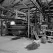 Huntingtowerfield, Bleach and Dye Works, Interior
View looking SW showing 3 bowl impregnating mangle, 100'' face (at E side of stentering department)