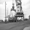 Ayr Harbour
View from ESE showing crane lowering truck