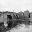 Ayr, Auld Brig
View from NE showing NW front of bridge and NE front of numbers 11-15
