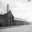 Glasgow, 14 Shore Street, River Street Factory
View from ENE showing N front of weaving sheds with square chimney stalk in background