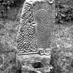 View of ogam-inscribed Pictish cross-slab.
Original negative captioned: 'The Ogham Stone at Aboyne Castle July 1902'.