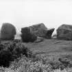 View of recumbent stone and flankers.
Original negative captioned: 'Ardlair Stone Circle, Kennethmont Recumbent Stone and Pillars from inside of Circle / View from inside of Circle May 1906'.
