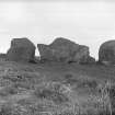 View of recumbent stone and flankers.
Original negative captioned: 'Ardlair Circle, Kennethmont, Recumbent Stone from outside Circle / May 1906'.
