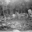 View of recumbent stone, flankers and interior of circle.
Photograph possibly taken during excavations (and therefore possibly taken in September 1904).
