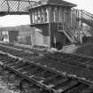 View from E showing SSE and ENE fronts of signal box with part of footbridge in background