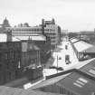 View looking WSW from Randolph and Elder Engineering Works showing NNE and ESE fronts of numbers 99-103 Kingston Street with numbers 109-113 Kingston Street in left background and part of Kingston Dock in right background