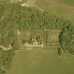 Oblique aerial view of Earlshall country house, formal garden and dovecot, taken from the W.
Scanned image of D 5946 CN.