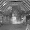 Scar Steading: View of interior of grain mill, S-E end, and looking towards the grain drying kiln.
Digital image of D 3377