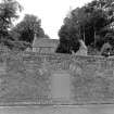 View from SW entrance to ice house, with Church of Scotland also visible in background