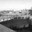 View from S showing lock gates leading into Wet Dock.