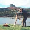 Alan Leith (RCAHMS) using a Wild Self-reducing alidade and plane-table during an archaeological survey. 
